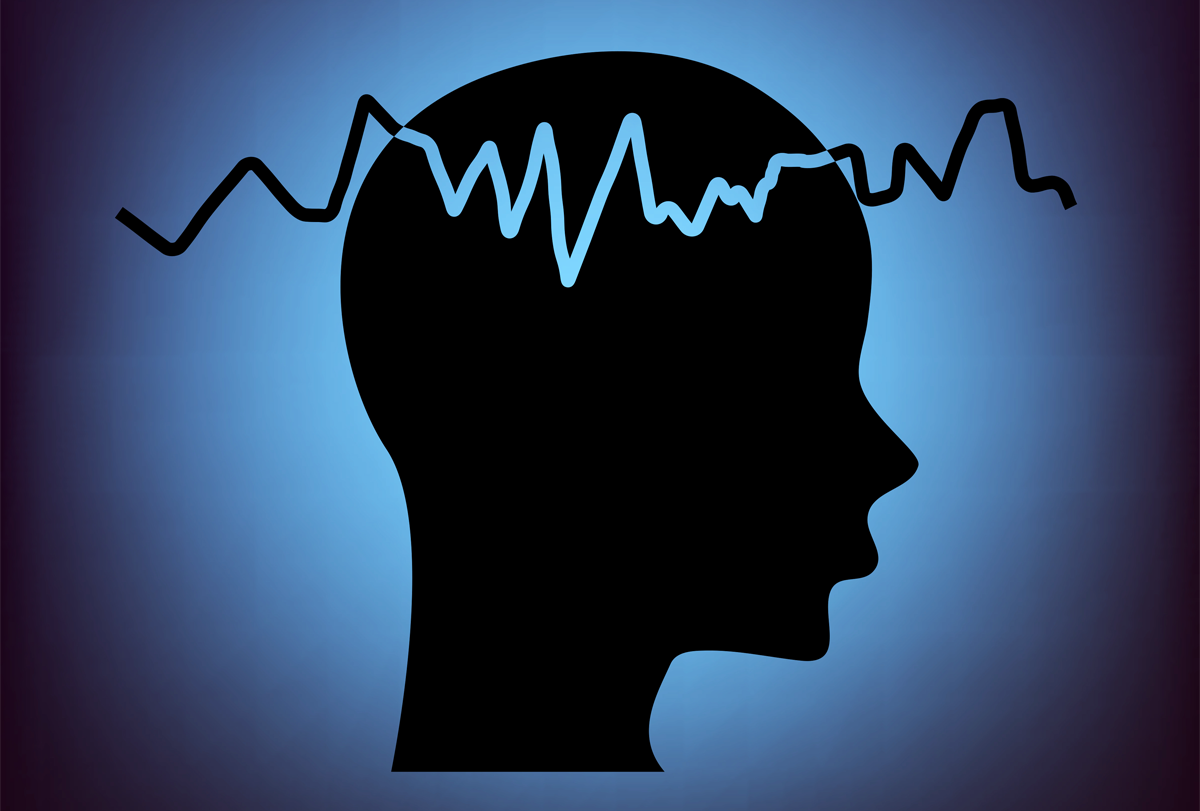 Illustration of a brain wave overlaid on a silhouette of a head.