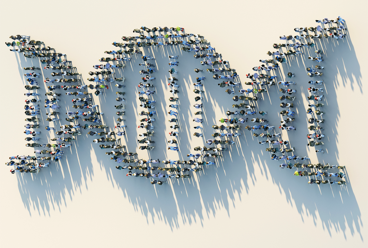 A crowd of people viewed from above forms the shape of a DNA helix.
