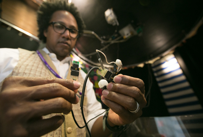 Brain analyst: Fenton holds sensors that can measure tiny electrical signals from the brains of free-moving rodents.