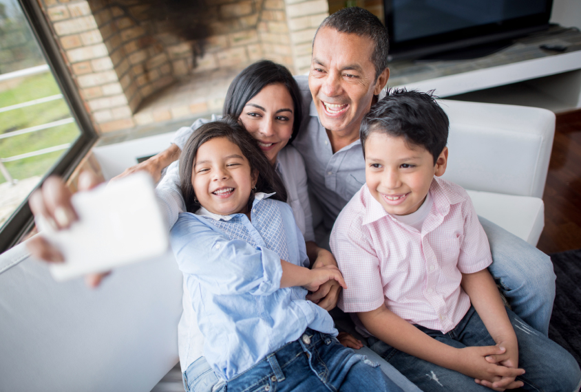 Hispanic family taking a selfie