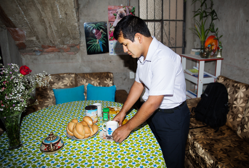 Ronald Pesantes (26) is seen preparing he’s breakfast at he’s house in Villa Maria del Triunfo district in Lima, Peru. 11.26.2018 Sebastian Montalvo Gray