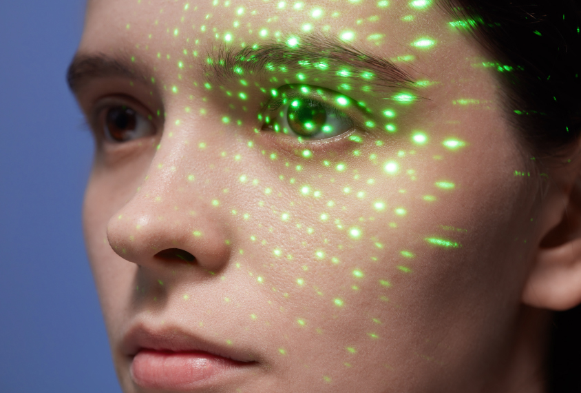A woman's eye is scattered with light, tracking eye movement