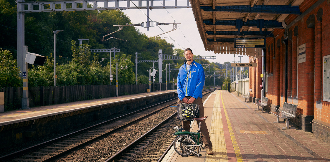 William Mandy portrait at train station near his home.