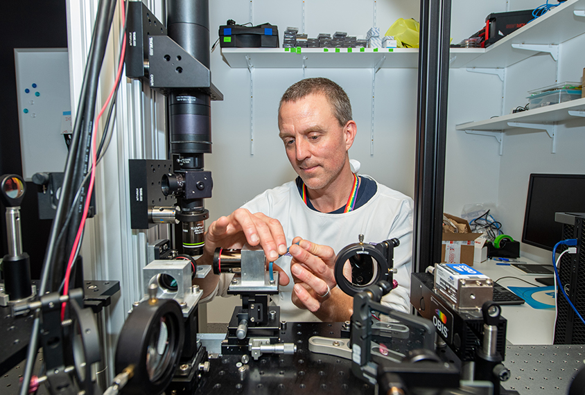 Scientist Ethan Scott in his lab.