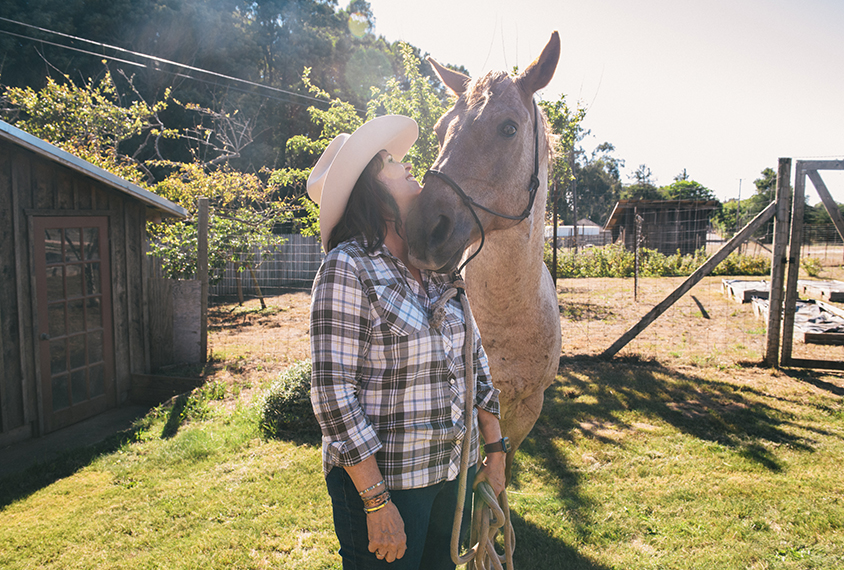 Judy Van De Water with her horse Hank in Fort Bragg, CA.