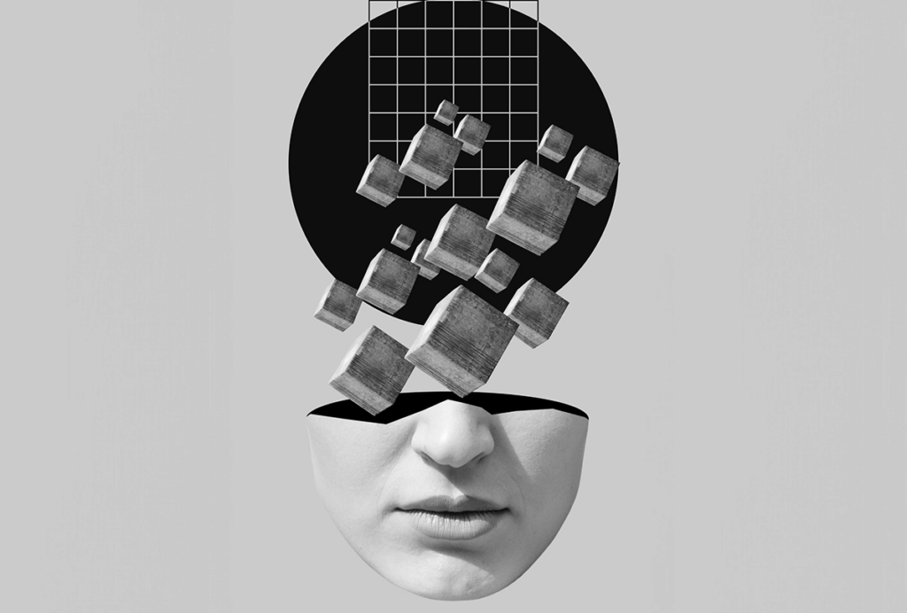 Black-and-white image of cubes floating out of the bottom half of a human head.